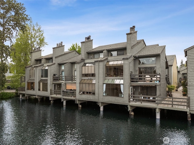 7 Lake Bellevue Dr Unit 109, Bellevue, WA 98005 - back of property with a water view and a chimney