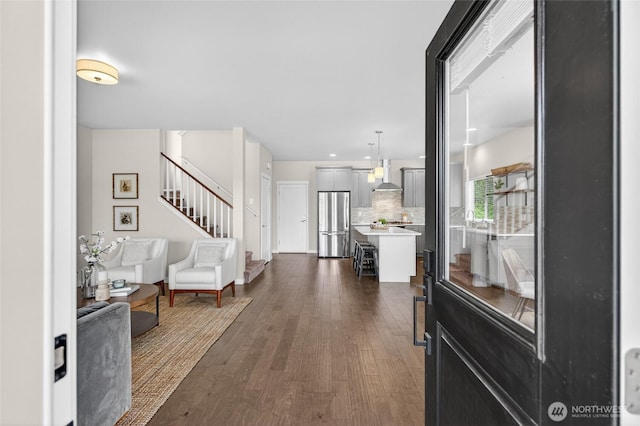 704 Springside Ln, Bellingham, WA 98226 - foyer featuring stairs and dark wood-style flooring