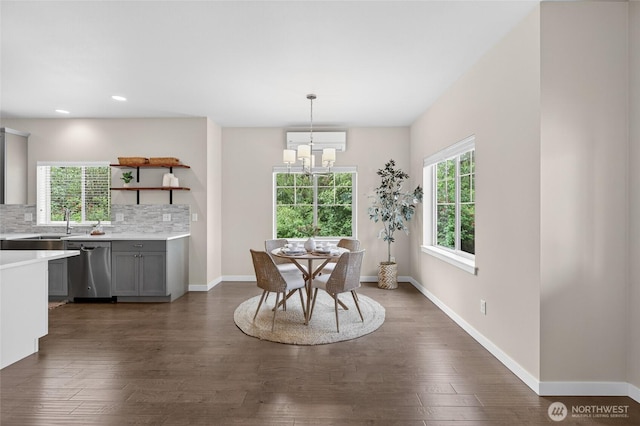 704 Springside Ln, Bellingham, WA 98226 - dining area with dark wood-style floors, a chandelier, and recessed lighting