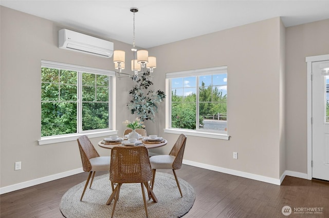 704 Springside Ln, Bellingham, WA 98226 - dining area featuring an AC wall unit, wood finished floors, and a chandelier