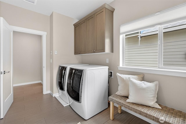 704 Springside Ln, Bellingham, WA 98226 - laundry room featuring separate washer and dryer and cabinet space