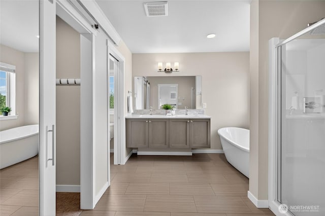704 Springside Ln, Bellingham, WA 98226 - bathroom with double vanity, a shower stall, and a freestanding bath