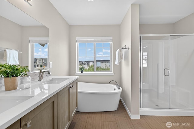 704 Springside Ln, Bellingham, WA 98226 - full bath with a shower stall, double vanity, and a freestanding tub