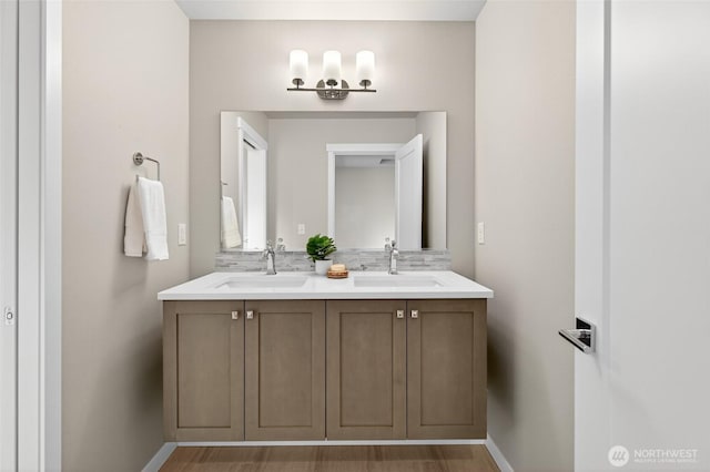 704 Springside Ln, Bellingham, WA 98226 - bathroom featuring double vanity and tasteful backsplash