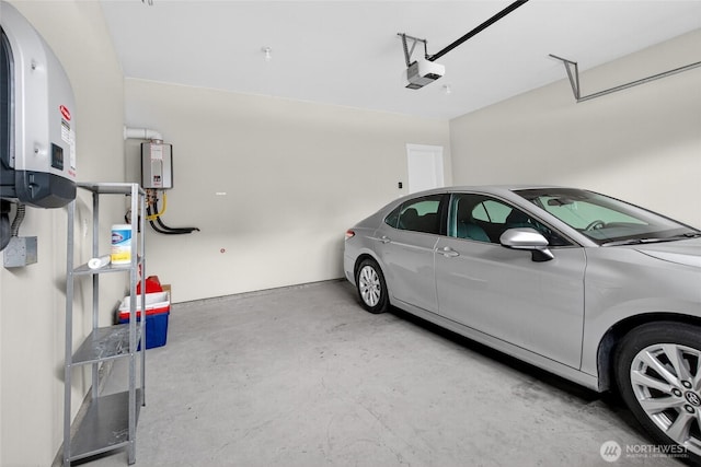 704 Springside Ln, Bellingham, WA 98226 - garage featuring a garage door opener and water heater
