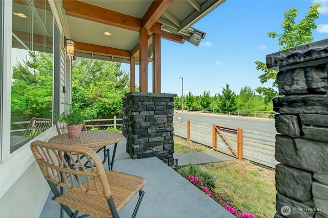 704 Springside Ln, Bellingham, WA 98226 - covered porch featuring view of wooded area