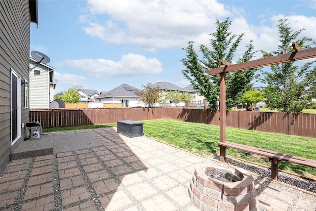 18509 11th Ln E, Spanaway, WA 98387 - view of patio / terrace featuring a residential view and an outdoor fire pit