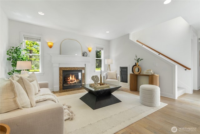 22309 1st Dr SE, Bothell, WA 98021 - living room with stairs, a fireplace, wood finished floors, and recessed lighting