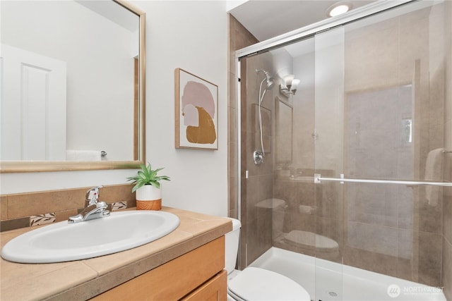 22309 1st Dr SE, Bothell, WA 98021 - bathroom with vanity, a stall shower, and toilet
