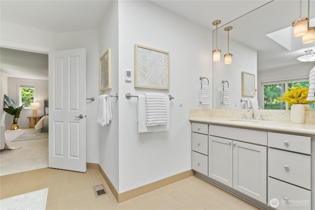 22309 1st Dr SE, Bothell, WA 98021 - full bathroom with ensuite bath, vanity, baseboards, and tile patterned floors