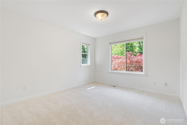 22309 1st Dr SE, Bothell, WA 98021 - carpeted spare room with baseboards