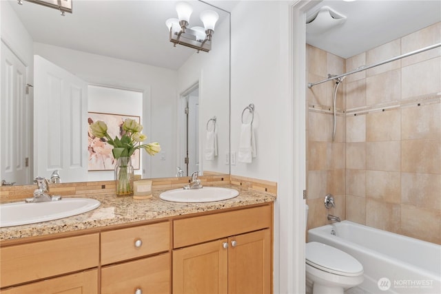22309 1st Dr SE, Bothell, WA 98021 - bathroom featuring double vanity, tub / shower combination, and toilet