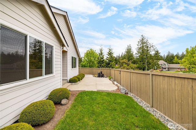 view of yard with a patio area