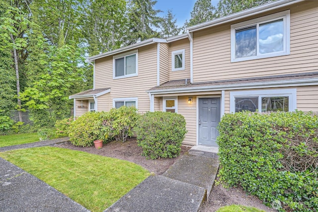 23723 12th Pl S Unit 2005, Des Moines, WA 98198 - view of front of house with a front yard