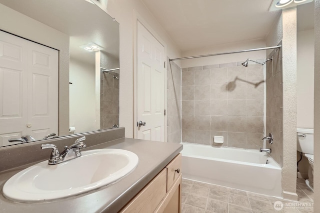 23723 12th Pl S Unit 2005, Des Moines, WA 98198 - full bath featuring toilet, vanity, and washtub / shower combination