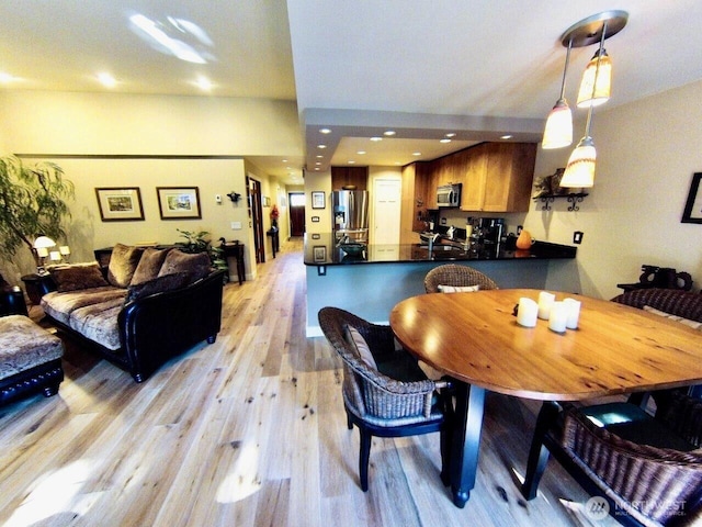 612 Kirkland Ave Unit A4, Kirkland, WA 98033 - dining space featuring light wood finished floors and recessed lighting