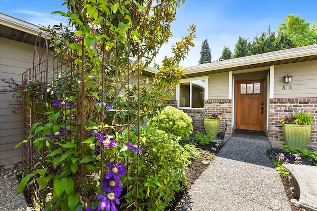 612 Kirkland Ave Unit A4, Kirkland, WA 98033 - property entrance featuring brick siding