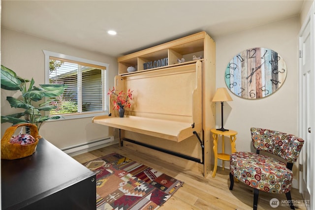 612 Kirkland Ave Unit A4, Kirkland, WA 98033 - sitting room featuring baseboard heating, light wood-style flooring, and recessed lighting