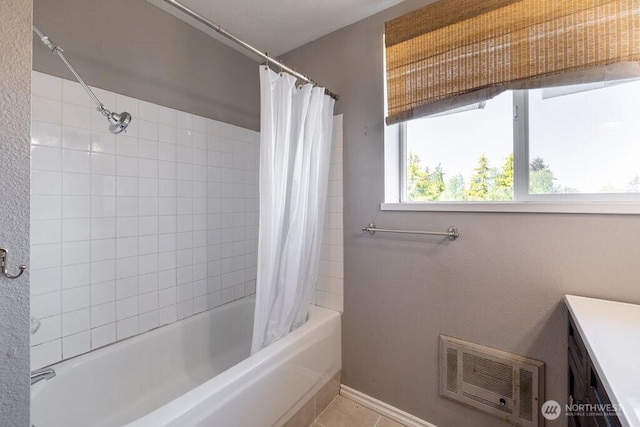 301 E Silberhorn Rd, Sequim, WA 98382 - full bath featuring shower / bath combo, tile patterned floors, baseboards, and vanity