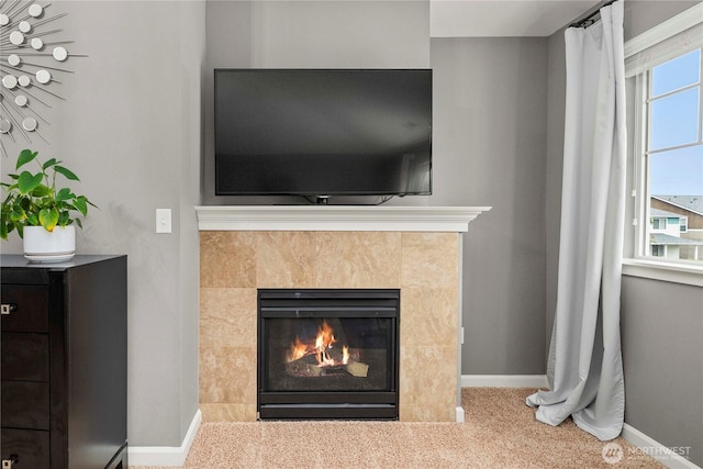 6503 Wrangler Dr SE, Tumwater, WA 98501 - detailed view of baseboards, a fireplace, and carpet flooring