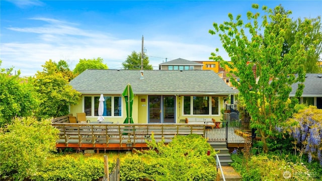 4808 38th Ave SW, Seattle, WA 98126 - rear view of property featuring a shingled roof and a wooden deck