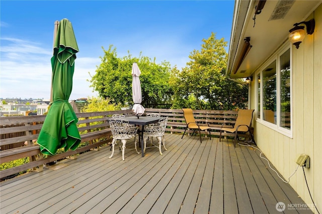 4808 38th Ave SW, Seattle, WA 98126 - wooden terrace with outdoor dining area