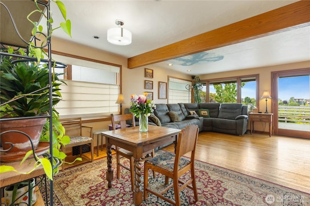 4808 38th Ave SW, Seattle, WA 98126 - dining area with light wood-style floors, plenty of natural light, and beamed ceiling
