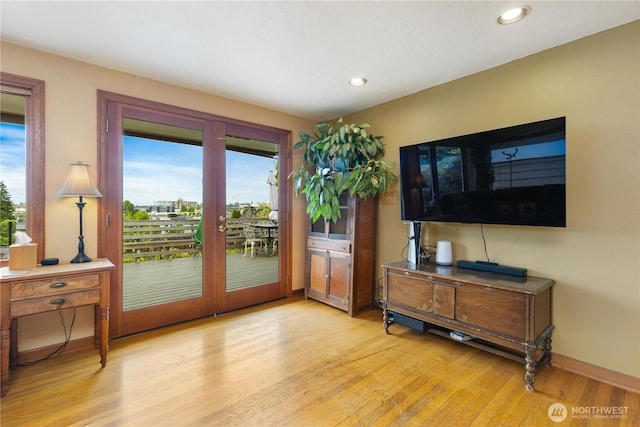 4808 38th Ave SW, Seattle, WA 98126 - entryway with light wood finished floors, baseboards, and recessed lighting