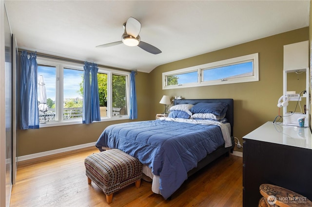 4808 38th Ave SW, Seattle, WA 98126 - bedroom featuring wood finished floors, baseboards, and a ceiling fan