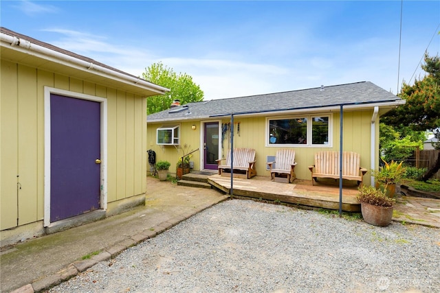 4808 38th Ave SW, Seattle, WA 98126 - rear view of property with a wooden deck and roof with shingles