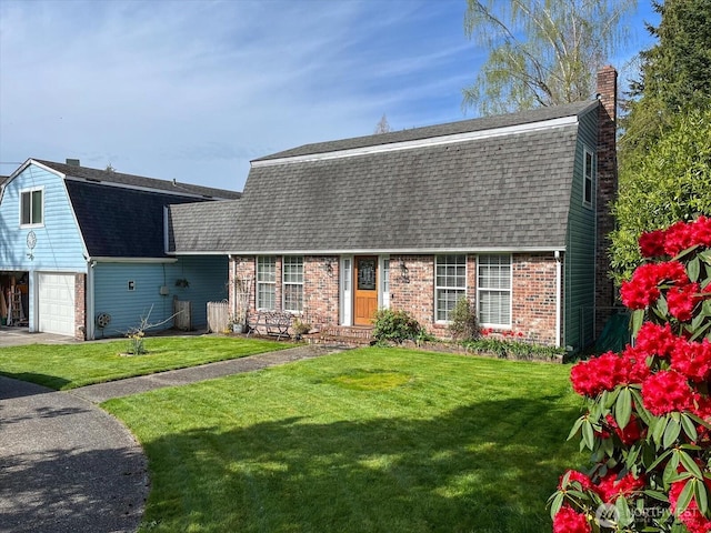 17910 Spruce Way, Lynnwood, WA 98037 - dutch colonial with a gambrel roof, roof with shingles, a chimney, a front yard, and brick siding