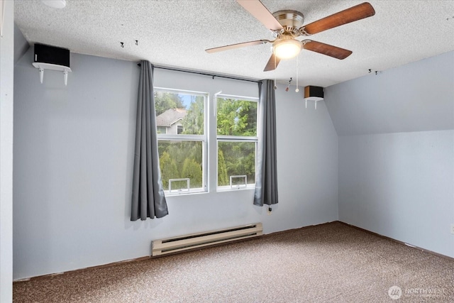 17910 Spruce Way, Lynnwood, WA 98037 - additional living space featuring a baseboard radiator, carpet, a ceiling fan, and a textured ceiling
