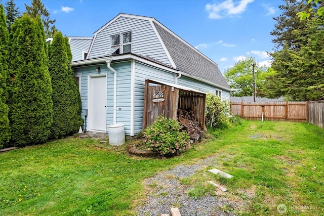 17910 Spruce Way, Lynnwood, WA 98037 - rear view of property with a gambrel roof and an outbuilding
