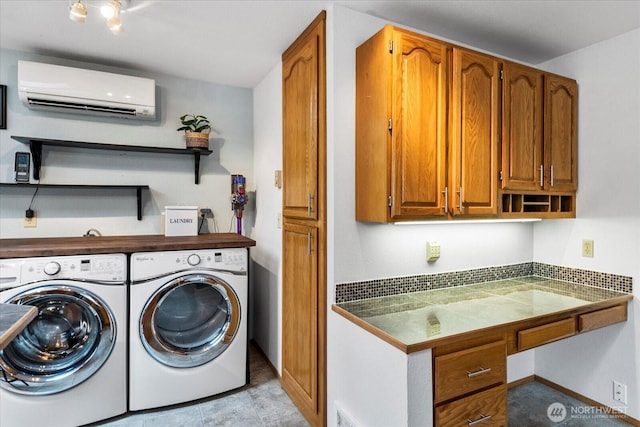 17910 Spruce Way, Lynnwood, WA 98037 - laundry room with a wall mounted AC, independent washer and dryer, and cabinet space