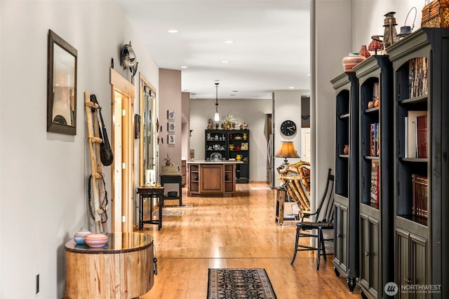2720 NW Cascade Ave, East Wenatchee, WA 98802 - entrance foyer featuring light wood finished floors, a barn door, and recessed lighting