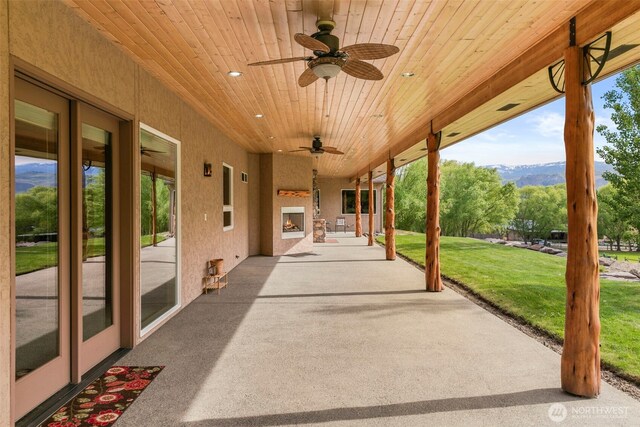 2720 NW Cascade Ave, East Wenatchee, WA 98802 - view of patio with a ceiling fan and a mountain view