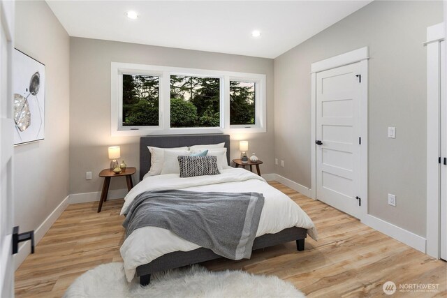 16250 SE Lake Moneysmith, Auburn, WA 98092 - bedroom with baseboards, light wood finished floors, and recessed lighting