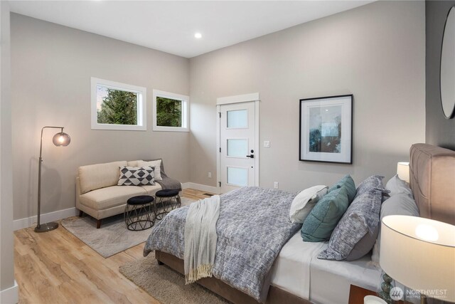 16250 SE Lake Moneysmith, Auburn, WA 98092 - bedroom featuring light wood-type flooring, recessed lighting, and baseboards