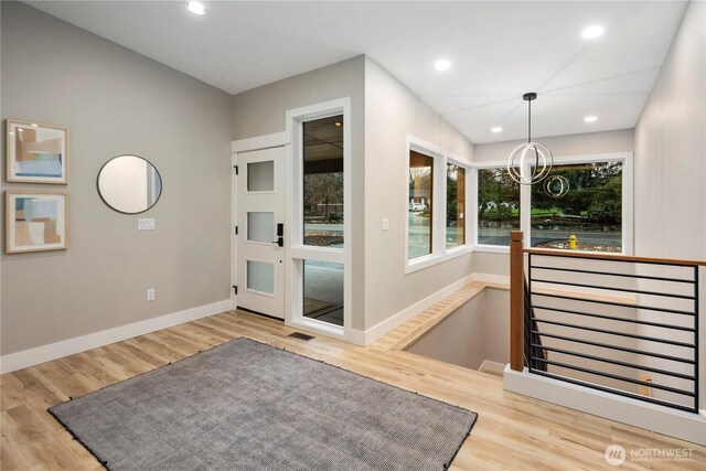 16250 SE Lake Moneysmith, Auburn, WA 98092 - entrance foyer with a chandelier, wood finished floors, baseboards, and recessed lighting