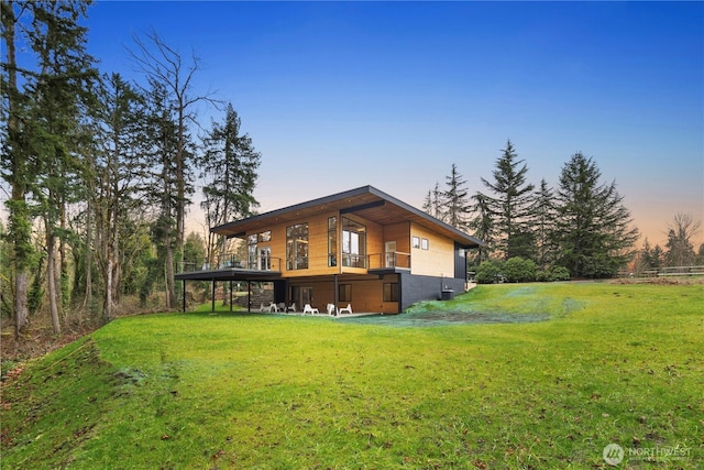 16250 SE Lake Moneysmith, Auburn, WA 98092 - back of house featuring a lawn