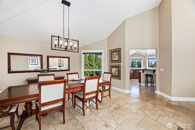 2815 211th Ave E, Lake Tapps, WA 98391 - dining room featuring a chandelier and high vaulted ceiling