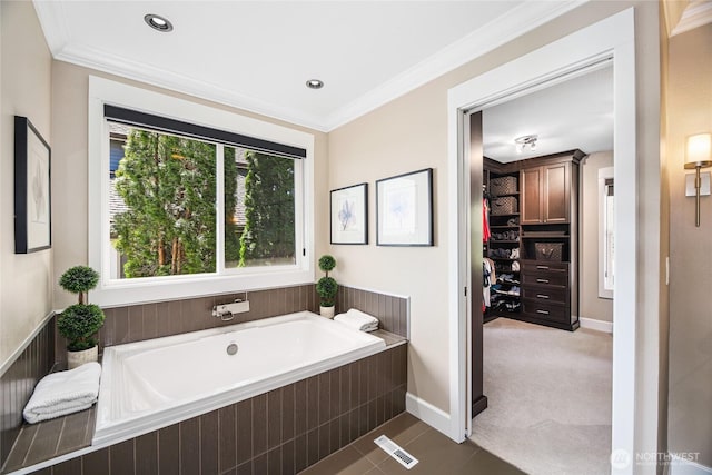 2815 211th Ave E, Lake Tapps, WA 98391 - bathroom with a garden tub, crown molding, and recessed lighting
