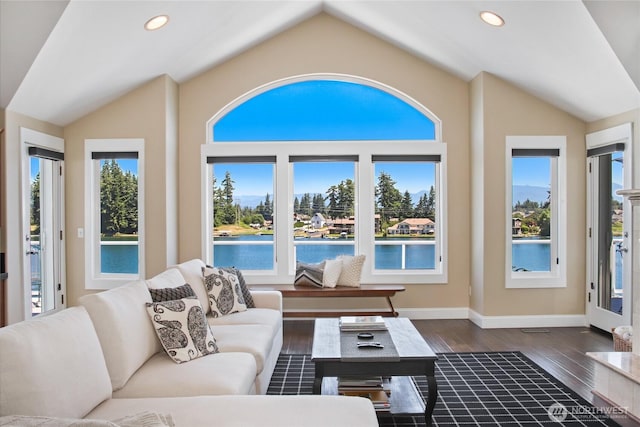2815 211th Ave E, Lake Tapps, WA 98391 - living room with lofted ceiling, a water view, dark wood-style floors, and recessed lighting