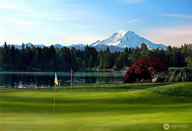 2815 211th Ave E, Lake Tapps, WA 98391 - view of home's community featuring a forest view, a water and mountain view, a lawn, view of golf course, and a putting area