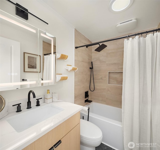 full bath with shower / bath combo with shower curtain, toilet, and vanity