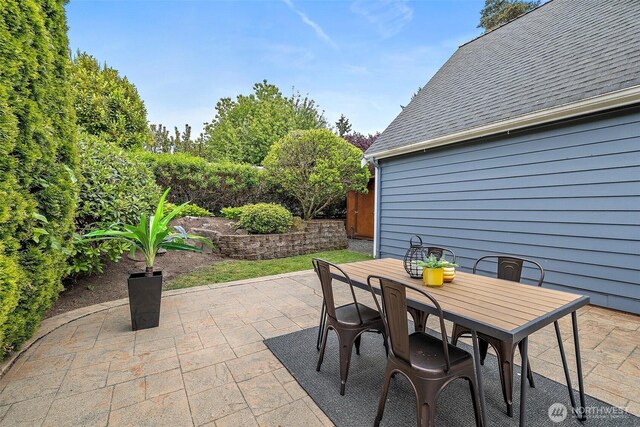 view of patio with outdoor dining area