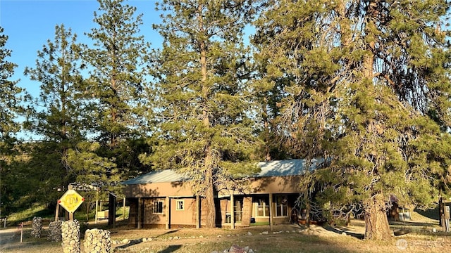169 Twin Lakes Dr, Winthrop, WA 98862 - view of front of house featuring metal roof
