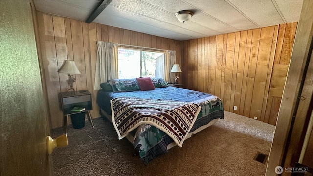 169 Twin Lakes Dr, Winthrop, WA 98862 - bedroom with carpet and wooden walls