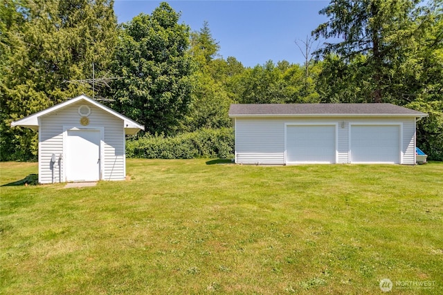 28705 48th Ave NW, Stanwood, WA 98292 - view of grassy yard with an outbuilding and a garage