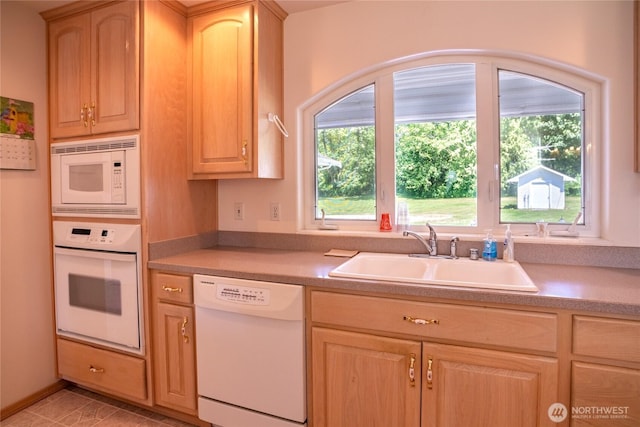 28705 48th Ave NW, Stanwood, WA 98292 - kitchen with white appliances, light brown cabinets, and light countertops
